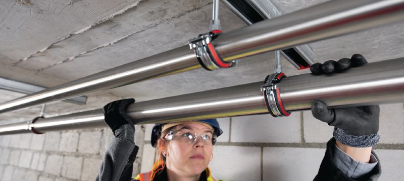 Gancho para tubos de fechamento rápido MP-U-I (isolamento acústico) Gancho para tubos galvanizado definitivo com isolamento acústico e fecho rápido tendo em vista a produtividade máxima em aplicações de malha Aplicações 1